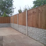 4 foot panels on 2 concrete rock faced gravel boards